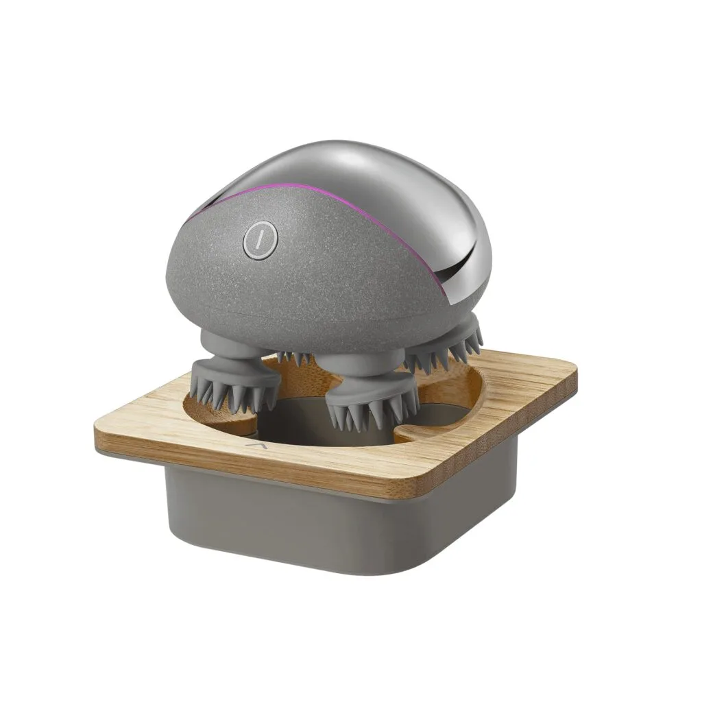 Galvos masažuoklis Breo Mini naudojamas ant pakaušio borealis.lt